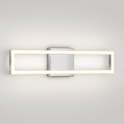 The Artika-CAN-dev Dover modern LED bathroom vanity light 5 CCT features a rectangular LED frame and central silver mounting plate, casting a soft, even glow on a light-colored wall.