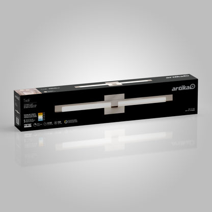 A black rectangular box for the Artika Tivoli modern LED bathroom vanity light 5 CCT, showing an image of the sleek wall-mounted fixture on the front and product details on the sides, set against a gray background.
