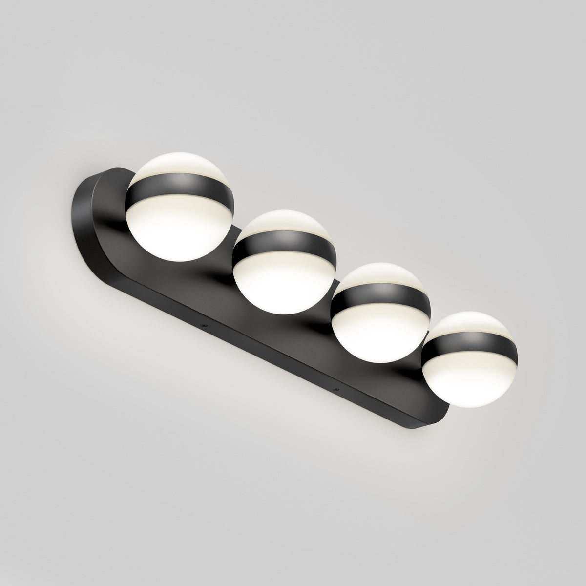 The Artika Baldric LED modern bathroom vanity light 3 CCT features four white globes and black bands, perfect for stylish mirror lighting.