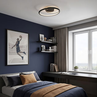 Modern bedroom with navy walls, sports poster, bookshelves, bed, and Artika Salto 14 in. LED flush mount ceiling light with tunable white.