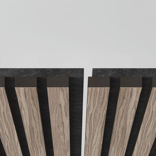 Close-up of the Artika Sonolok sound-absorbing wall panel kit, featuring alternating light wood and black slats in a modern geometric pattern against a white background.