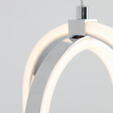 Close-up of a modern, minimalist pendant light with curved, chrome metal and glowing LED strips, set against a plain light gray background.