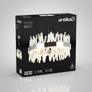 A black box showcases the Artika Enchanted LED pendant light with crystal-like accents, featuring a photo and product details on the front. The packaging highlights 2,250 lumens and 25,000-hour lifespan.