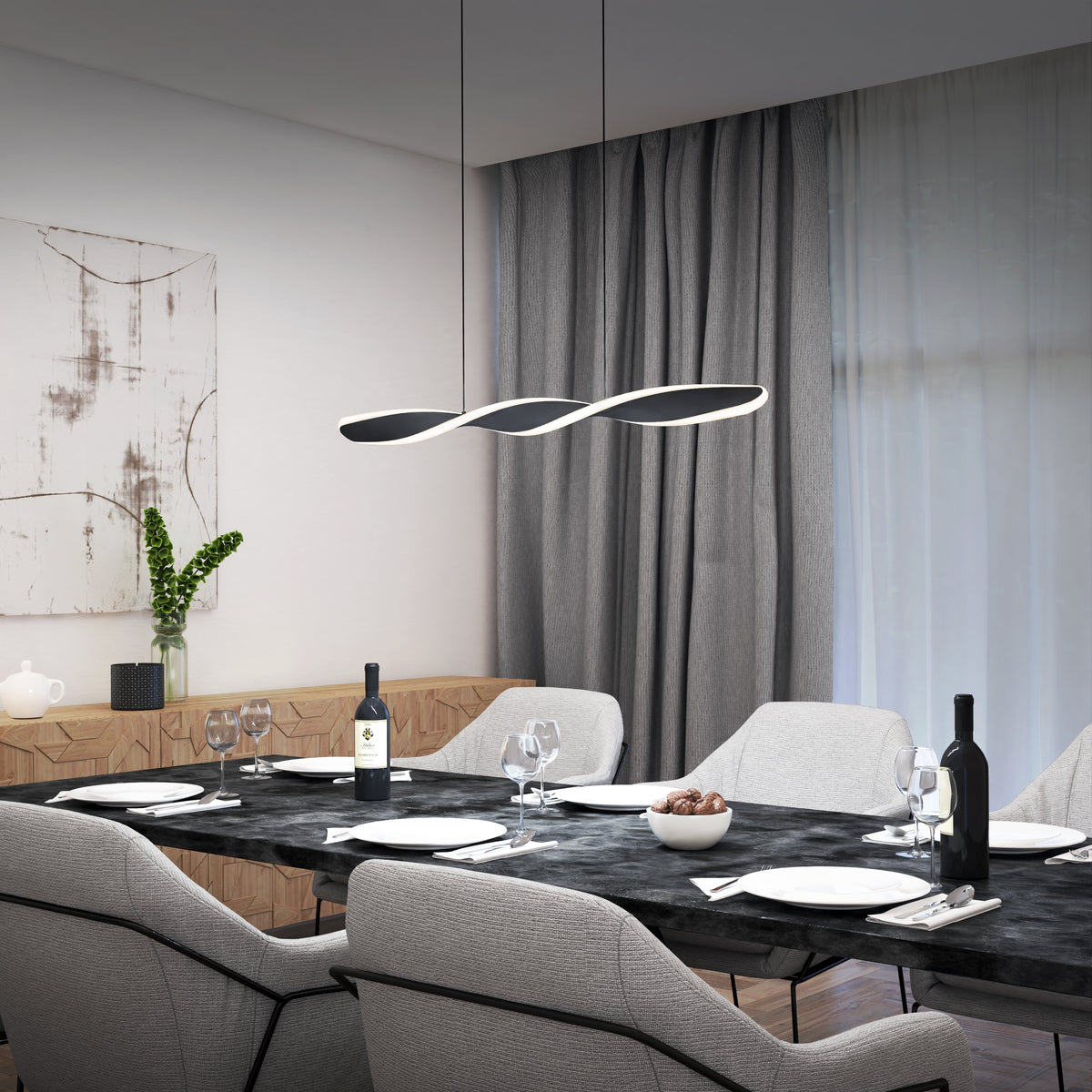 Modern dining room with a black marble table set for four, wine bottles, glasses, and a bowl of nuts. Above the table is a contemporary twisted pendant light. Gray chairs, curtains, and minimalist wall art complete the scene.