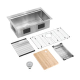 A stainless steel kitchen sink with accessories including a drying rack, wire grid, bamboo cutting board, metal strainer basket, and a round drain assembly, all displayed separately on a white background.