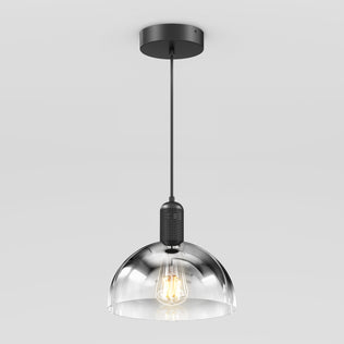 The Artika Nella Pendant without Bulbs features a modern clear glass dome-shaped shade and a black cord and fixture, shown here against a plain white background.