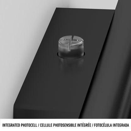 Close-up of a round integrated photocell sensor on a black device. Below the image, text reads: Integrated Photocell / Cellule Photosensible Intégrée / Fotocélula Integrada.