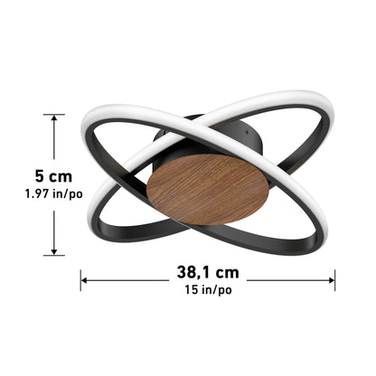 The Artika Atomic 15 in. LED flush mount light features two interlocking black and white rings, a wooden base, measures 5 cm (1.97 in) high by 38.1 cm (15 in) diameter, and is shown on a white background with measurement labels.