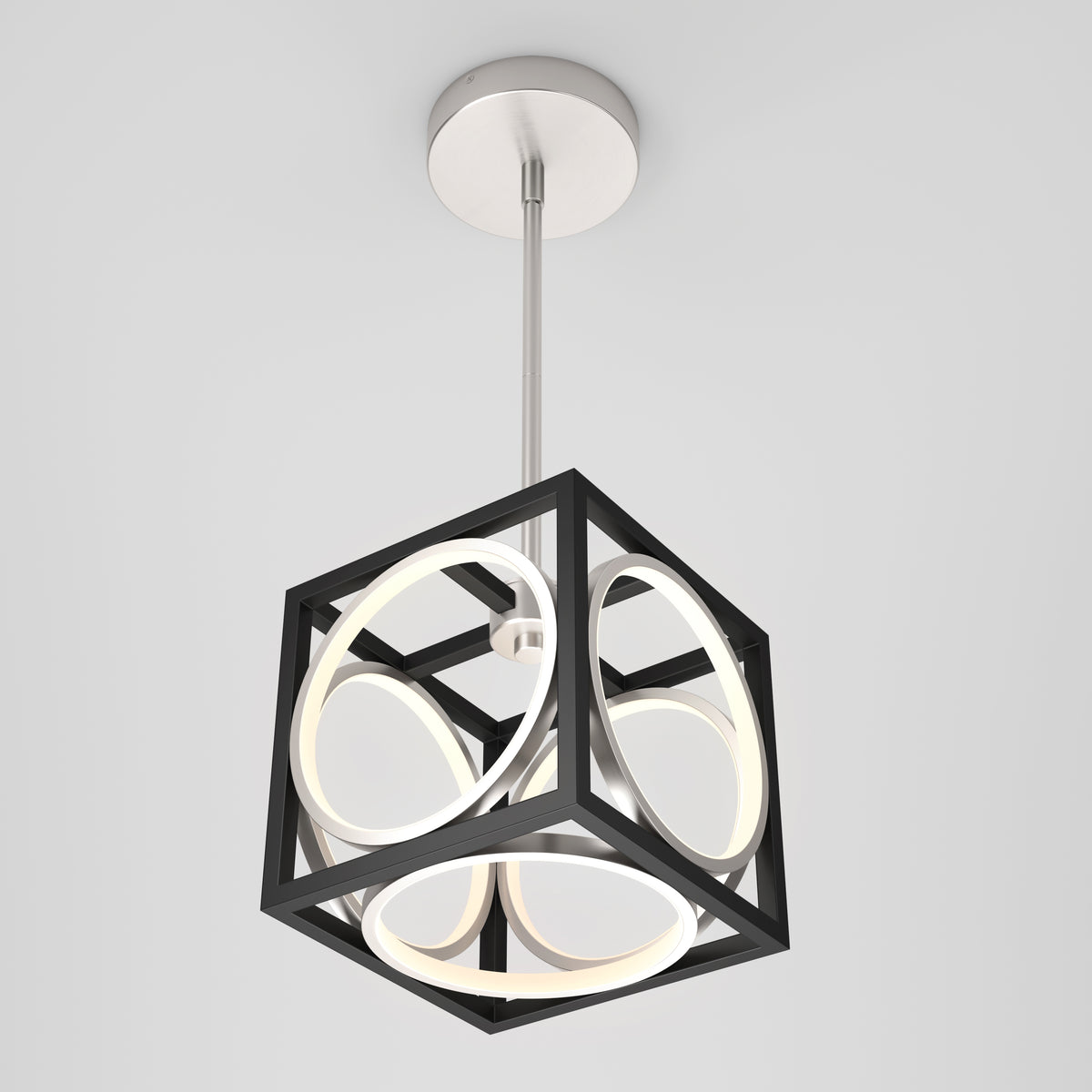 A modern ceiling light fixture with a black cubic frame enclosing circular LED lights, suspended from a metallic ceiling mount on a rod, set against a plain white background.