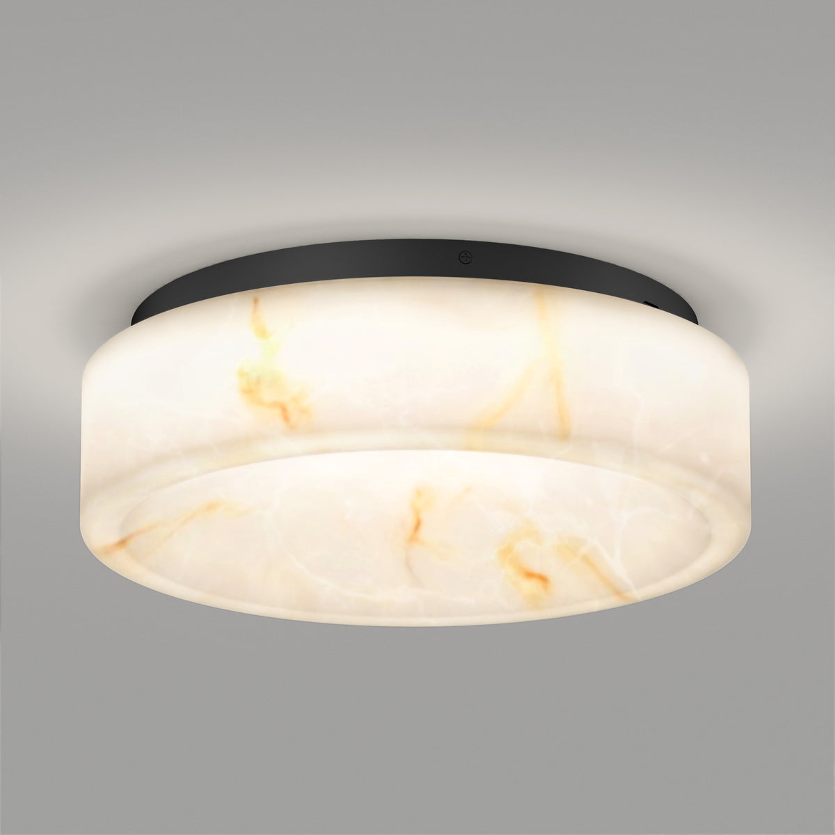 The Clifford 15 in. flush mount light by Artika features a modern round design with a black base and frosted white shade accented by subtle orange and brown marble veining, shown mounted on a plain gray ceiling.