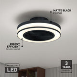Modern ceiling fan with matte black finish and integrated LED light, labeled as energy efficient with a 3-year warranty, mounted on a white ceiling in a contemporary room.