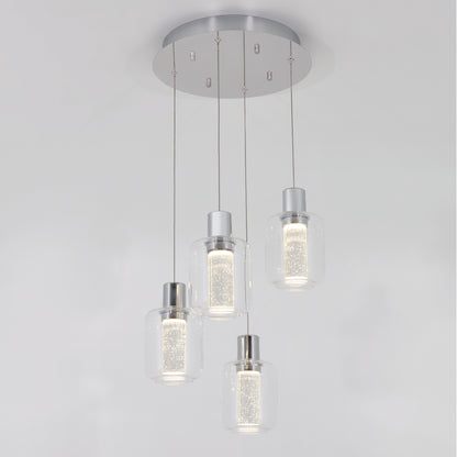 The Artika Champagne Globe 4-light LED pendant features four cylindrical glass shades with inner textured detail, suspended from a round metallic base, creating a modern ceiling light fixture.