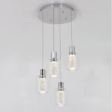 A modern ceiling light fixture with four hanging pendant lights, each featuring a clear cylindrical glass shade and a metallic silver base, suspended from a round silver ceiling plate.