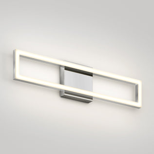 The Artika Dover 27-in Integrated LED 5-CCT Vanity Light Bar features a chrome finish and sleek rectangular design, mounted on a light gray wall—an ideal modern touch for any bathroom.