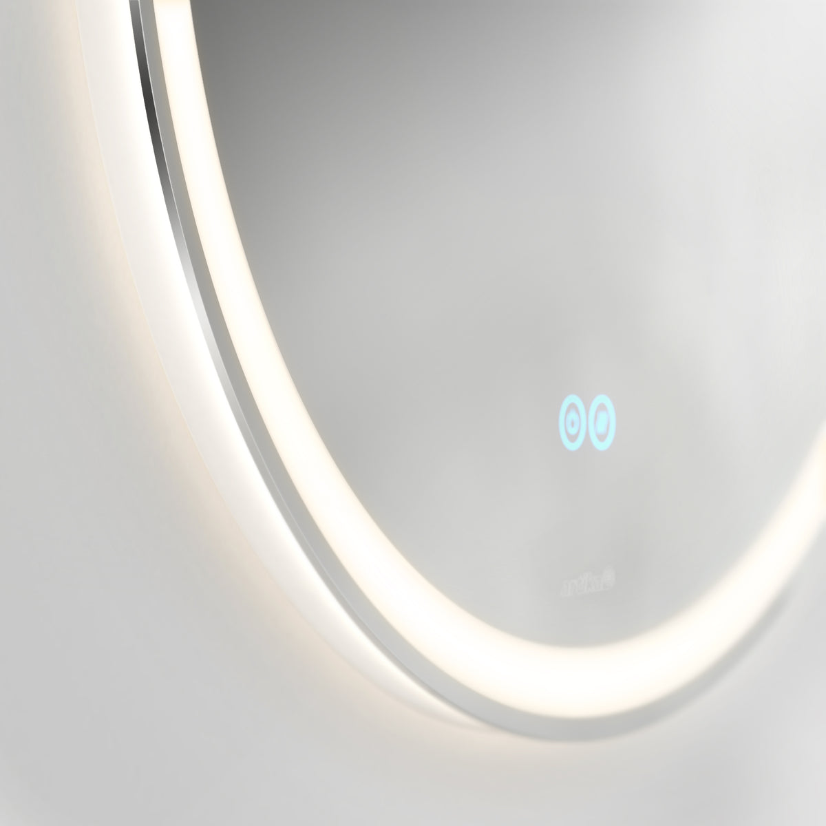 A close-up of the Artika Ayla 28 in. LED mirror 3 CCT with defogger, featuring a modern circular design, illuminated LED ring, and two blue touch sensor icons for a minimalistic, sleek look.
