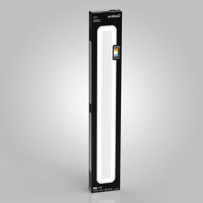 A slim, rectangular matte black ceiling light with white accents, branded “Artika Aiden 48 in. LED modern flush mount light 5 CCT,” and a color temperature chart on the top right, set against a light gray background.
