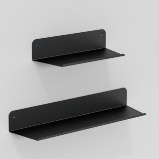 The Artika Sonokit set includes sleek black shelves and hooks for Sonolok and Sonofold wall panels. Their minimalist design ensures quick installation and adds stylish, functional storage to any modern space.