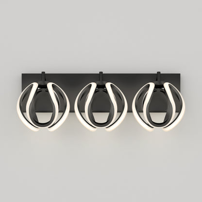 The Artika Vivaldi LED contemporary bathroom vanity light features three round, open geometric shades with curved LED strips on a rectangular black base, blending modern style with versatile 3 CCT lighting.