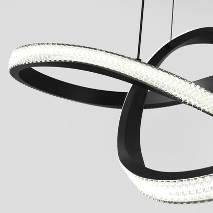 The Artika Morgan LED contemporary pendant light 5 CCT features modern interlocking black rings with integrated textured lights, suspended by thin wires against a plain light gray background.