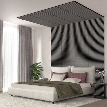 A modern bedroom featuring the Artika Sonolok 15.5 ft sound-absorbing wall panel kit (4-pack), a padded bed, mauve and white pillows, green throw blanket, sheer curtains, potted plant, and a small table with lamp and books.