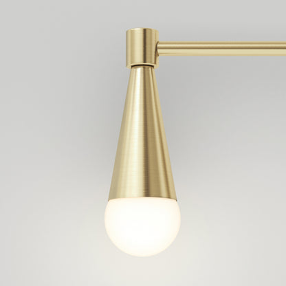 The Wayden LED mid-century bathroom vanity light by Artika features a brushed gold cone-shaped metal fixture with a frosted round bulb, shown mounted against a plain light gray background.