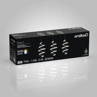 A rectangular Artika Chorus 3-light LED pendant light 5 CCT box with a black background, featuring three spiral-shaped hanging lights, product details, and certification icons on the front.