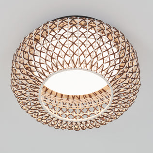The Artika Benson 15 in. LED flush mount light features a woven, dome-shaped design with natural tones and a soft, diffused glow, adding style to any white ceiling with its elegant lattice pattern and adjustable 5 CCT settings.