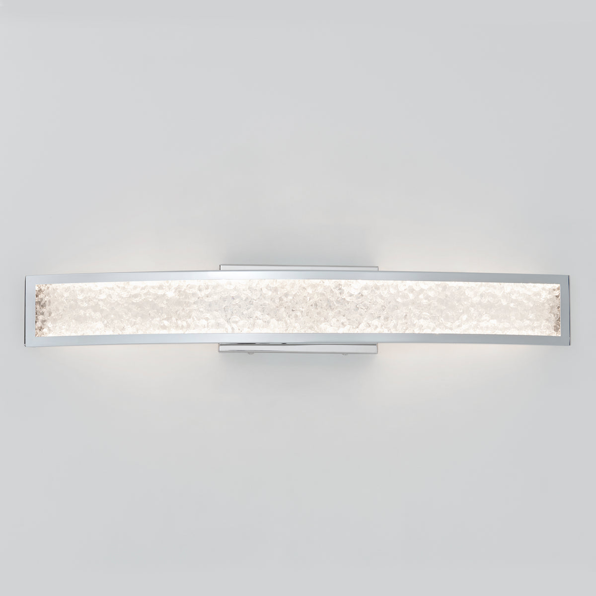 The Artika Glitter 27-in (69 cm) Integrated LED Vanity Light Bar for Bathroom features a modern chrome frame and a gently curved frosted glass shade, casting a soft, even glow.
