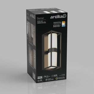 Box of an Artika Sherman modern LED indoor-outdoor wall light 5 CCT. The packaging shows the black rectangular fixture with a white cylindrical center, details about its features, and images of it installed on a wall.