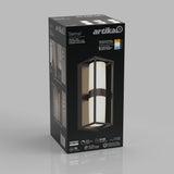 A product box for the Artika Sherman LED wall light, featuring an image of the fixture with a rectangular black metal frame and cylindrical white light, for indoor or outdoor use. Text highlights features and specifications.