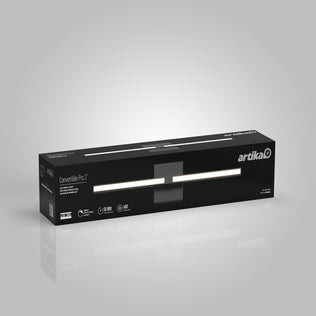 A black rectangular Artika box displays the Convertible Pro 24-in (61 cm) Integrated LED Vanity Light Bar for Bathroom against a light gray background, featuring product highlights and its slim, modern design—ideal for bathroom lighting.
