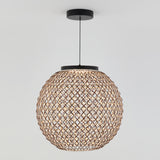 A spherical pendant light with a woven, lattice-style rattan shade hangs from a black ceiling mount against a plain white background.