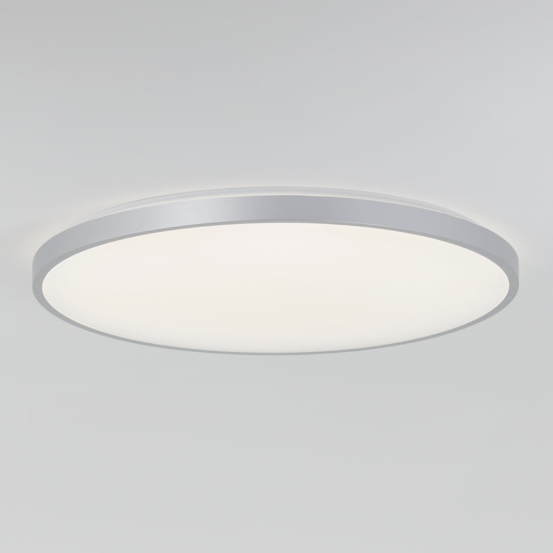 The Artika Jupiter 23 in. LED flush mount light features a white diffuser, silver trim, dimming presets, and remote control.