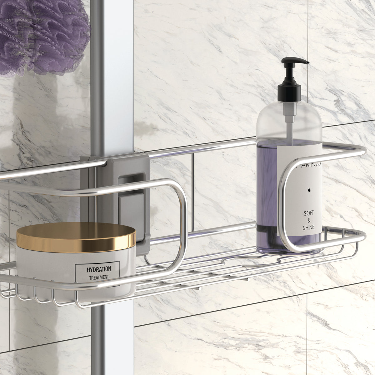 A metal shower shelf holds a round container labeled Hydration Treatment and a pump bottle labeled Soft & Shine Shampoo, against a white and gray marble tiled wall. A purple shower puff hangs in the background.