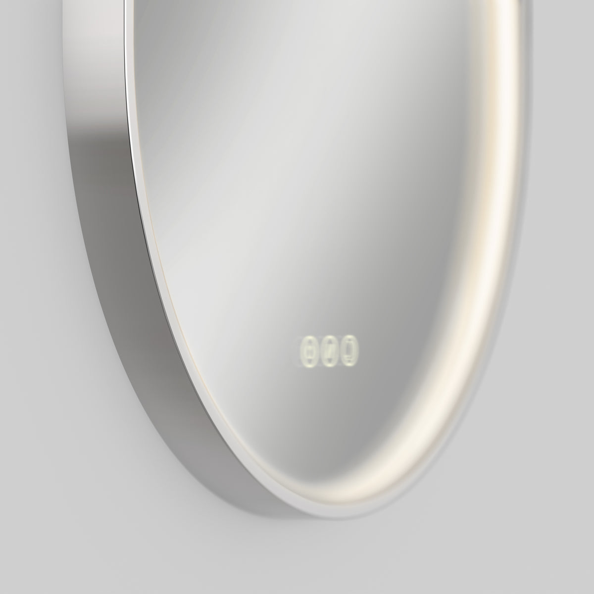 A close-up of a round, modern wall mirror with built-in LED lighting around the edge and an illuminated digital clock display reading 8:00 at the bottom of the mirror.