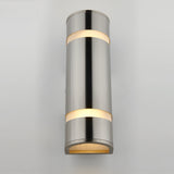 A modern cylindrical wall sconce light made of brushed metal with illuminated bands at the top, middle, and bottom, mounted on a light gray wall.
