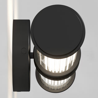 The Artika Kendra 27-in (69 cm) Integrated LED 3-CCT Vanity Light Bar for Bathroom features a modern matte black design with a textured cylindrical finish and glass diffuser for bright illumination.