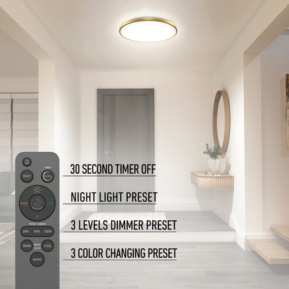 A modern hallway features the Artika Europa 21 in. LED flush mount light with remote, above a console table and mirror. The remote highlights timer, night light, dimmer, and color-changing presets.