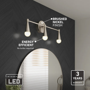 Artika's Wayden LED mid-century vanity light features 3 CCT adjustable whites and brushed nickel, perfect above round mirrors.