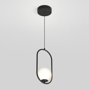 The Artika Bloom mid-century LED pendant light features a round white bulb suspended within an oval black metal frame, hanging from a black ceiling mount against a plain white background.