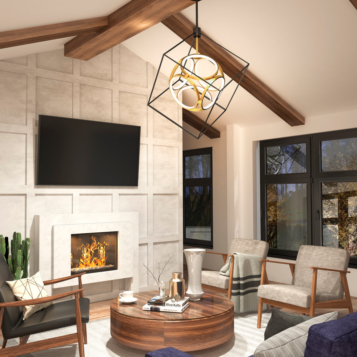 A modern living room with a vaulted ceiling, exposed wooden beams, a wall-mounted TV, a lit fireplace, a round wooden coffee table, gray armchairs, large windows, and a geometric pendant light.
