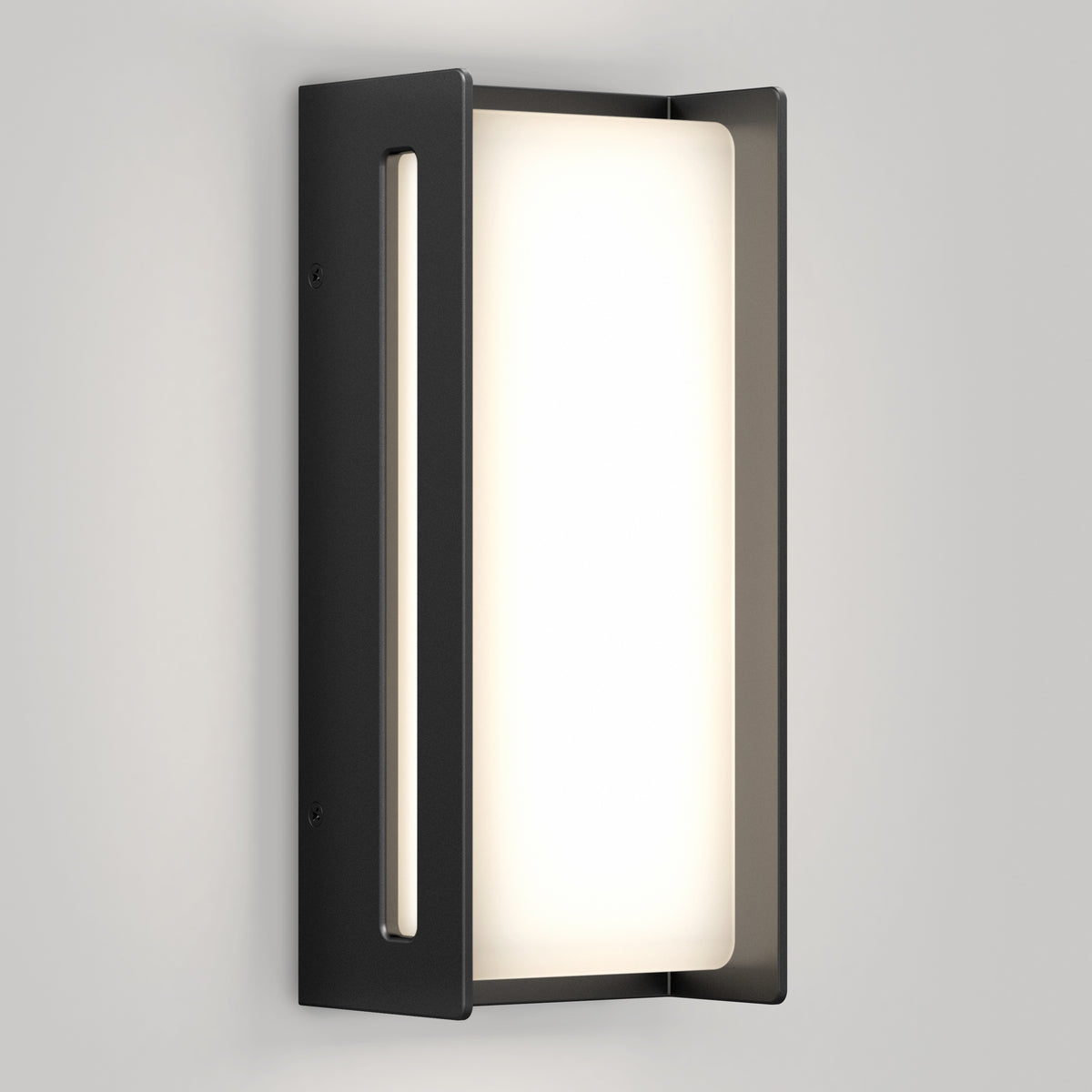 The Artika Ryker smart RGB indoor-outdoor wall light features a rectangular frosted glass shade and matte black frame, softly glowing against a light gray wall for a clean, contemporary look.