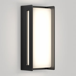 The Artika Ryker smart RGB indoor-outdoor wall light features a rectangular frosted glass shade and matte black frame, softly glowing against a light gray wall for a clean, contemporary look.