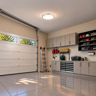 An Artika Altitude 15 in. (38 cm) Modern LED Flush Mount Ceiling Light 5 CCT installed in a garage.