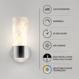 A modern wall sconce light with a cylindrical, marble-like shade is shown beside icons and text highlighting features: LED integrated, dimmable, 50,000 hours, 600 lumens, easy installation, and selectable white technology.