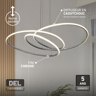 Artika Swirl Butterfly LED pendant light, 3 CCT, shown in bright room with plant and large curtains.