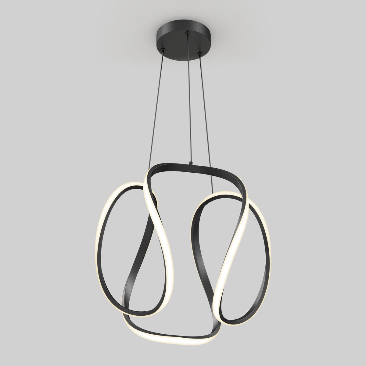 The Artika Vivaldi Big LED pendant light features sculptural black metal loops with integrated LED strips, suspended by thin wires from a round black ceiling mount, set against a plain light gray background.