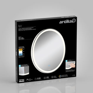 A black box for the Artika Ayla 28 in. LED mirror 3 CCT with defogger showcases a large round mirror with a lighted edge, highlighting features, icons, and images of touch controls and adjustable lighting.