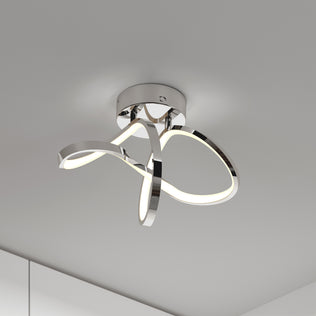 The Artika Loop modern LED flush mount light features an infinity-loop design and a shiny chrome base for stylish ceilings.