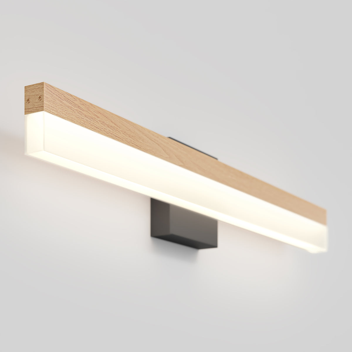 A modern wall-mounted light fixture with a rectangular wooden frame, a diffused white light panel, and a black rectangular base against a plain light gray wall.